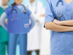 A picture of healthcare workers with a System C healthcare character in a hospital setting.