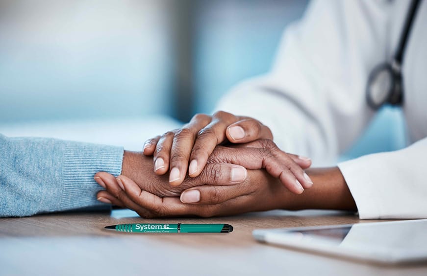 SystemC nurse holding hand